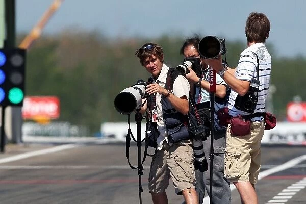 Formula One World Championship: Peter Fox Photographer and Darren Heath Photographer