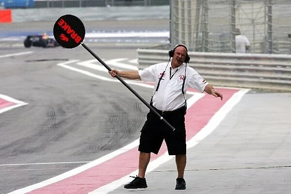 Formula One World Championship: Phill Spencer Chief Mechanic Super Aguri F1 Team with the lollipop