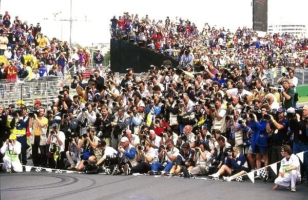 Formula One World Championship: The Photographers line up for the drivers group picture