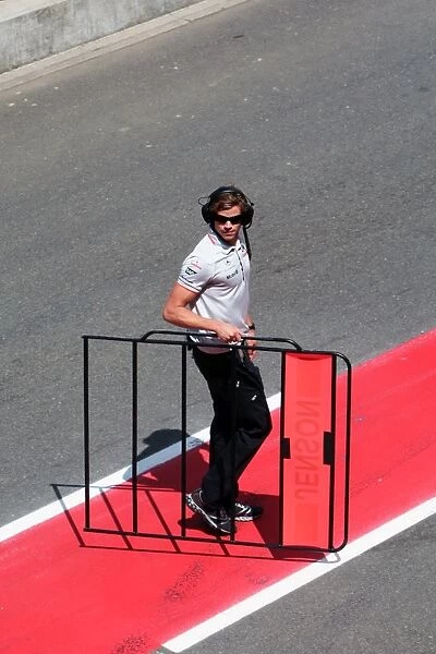Formula One World Championship: Pit board for Jenson Button McLaren returned to the garage