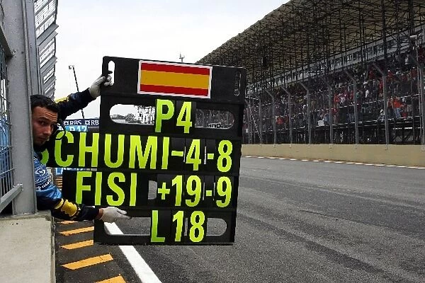 Formula One World Championship: Pit board sign held out for World Champion Fernando Alonso Renault