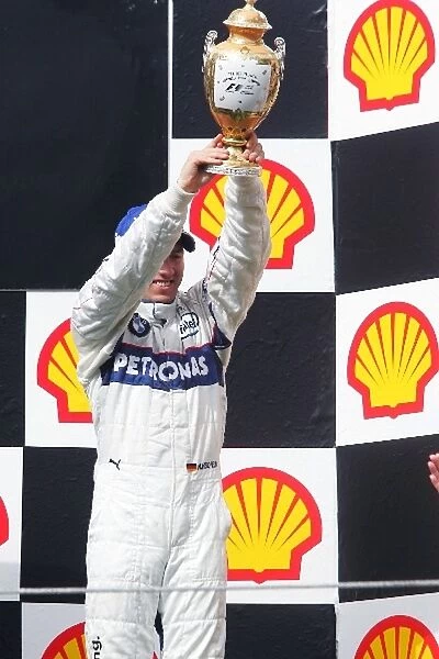Formula One World Championship: Third place Nick Heidfeld BMW Sauber F1 on the podium