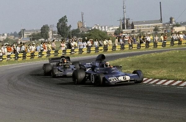 Formula One World Championship: Third placed Jackie Stewart Tyrrell 005 was able to hold off race winner Emerson Fittipaldi Lotus 72D until lap