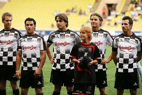 Formula One World Championship: Players line up at the celebrity football match