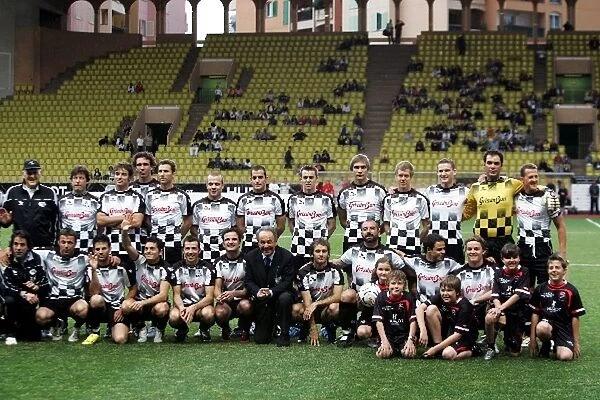 Formula One World Championship: The players line up for the charity football match