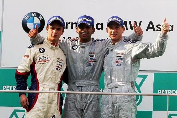 Formula One World Championship: The podium: J Grunwell, second; H Al Fardan, winner; S. Abay third