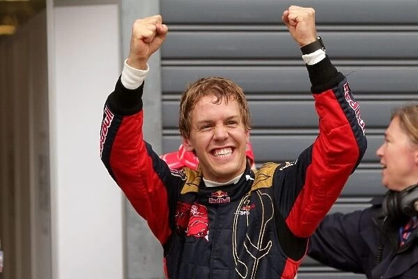 Formula One World Championship: Pole man Sebastian Vettel Scuderia Toro Rosso in parc ferme