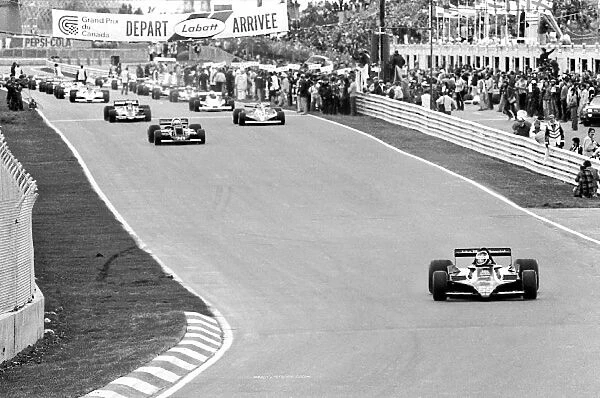 Formula One World Championship: Pole sitter Jean-Pierre Jarier Lotus 79, who retired from the race on lap 50 with a holed radiator, leads away