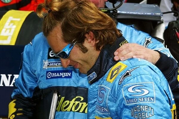 Formula One World Championship: Pole sitter and first time race winner Jarno Trulli Renault prepares on the grid