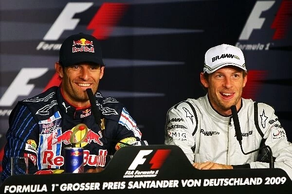 Formula One World Championship: Pole sitter Mark Webber Red Bull Racing and third placed Jenson Button Brawn Grand Prix in the FIA Press Conference