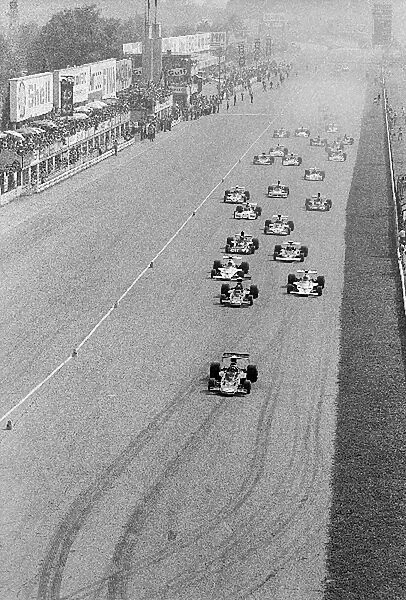 Formula One World Championship: Pole sitter and race winner Ronnie Peterson Lotus 72D leads the field at the start of the race
