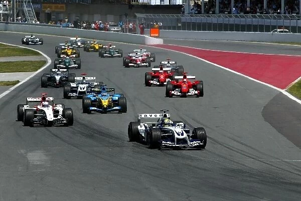 Formula One World Championship: Pole sitter Ralf Schumacher Williams BMW FW26 leads at the start of the race