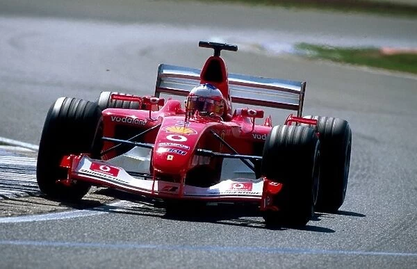 Formula One World Championship: Pole sitter Rubens Barrichello Ferrari F2003-GA went on to take a memorable victory