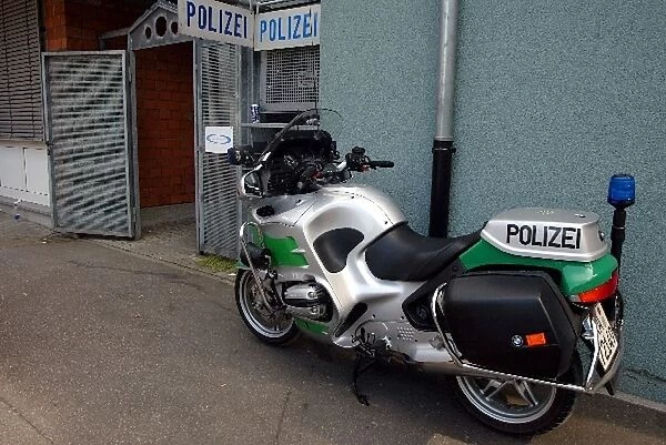 Formula One World Championship: A Police motorcycle outside the Police headquarters at the circuit