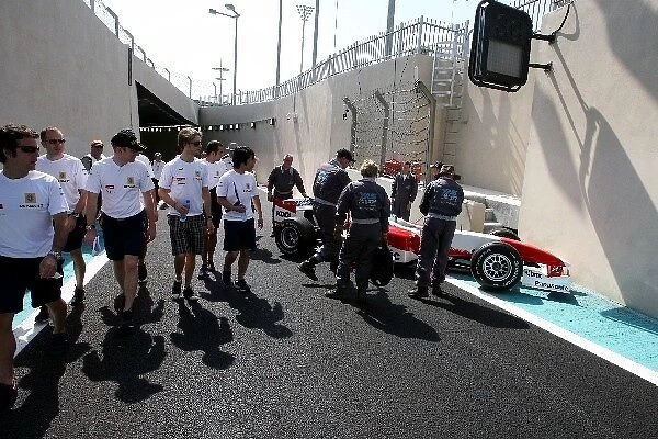 Formula One World Championship: A practice F1 car extraction takes place in the pit lane exit