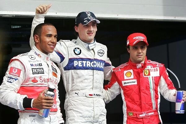 Formula One World Championship: The qualifying parc ferme: Lewis Hamilton McLaren, third; Robert Kubica BMW Sauber F1, pole position; Felipe Massa Ferrari