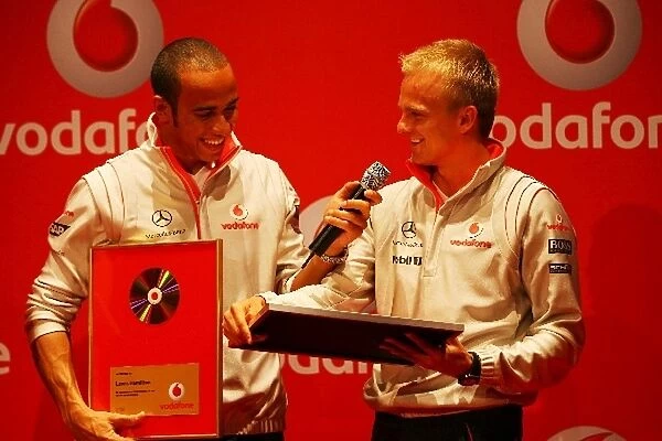 Formula One World Championship: Quiz winner Lewis Hamilton McLaren and his team mate Heikki Kovalainen McLaren at a Vodafone Music Quiz