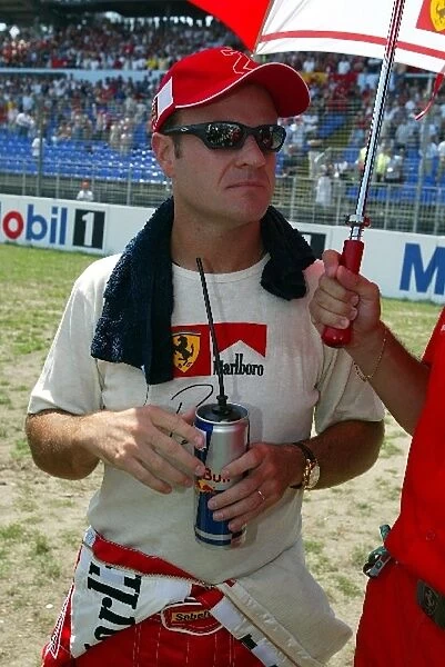 Formula One World Championship: Race retiree Rubens Barrichello Ferrari on the grid