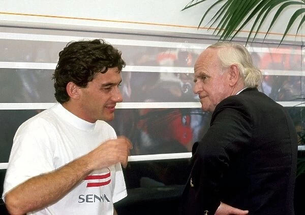 Formula One World Championship: Race winner Ayrton Senna, McLaren, talks with Professor Sid Watkins FIA Safety Delegate