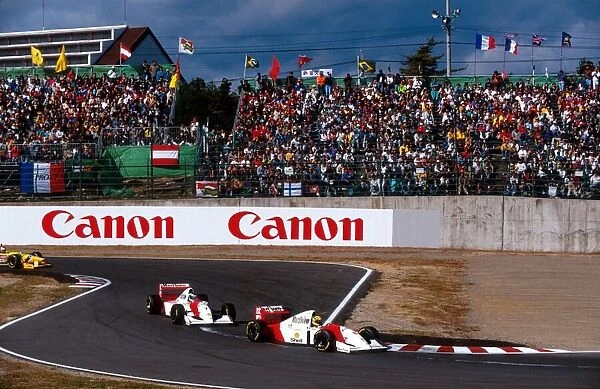 Formula One World Championship: Race winner Ayrton Senna McLaren MP4 / 8 leads his team mate and third place finisher Mika Hakkinen through the chicane