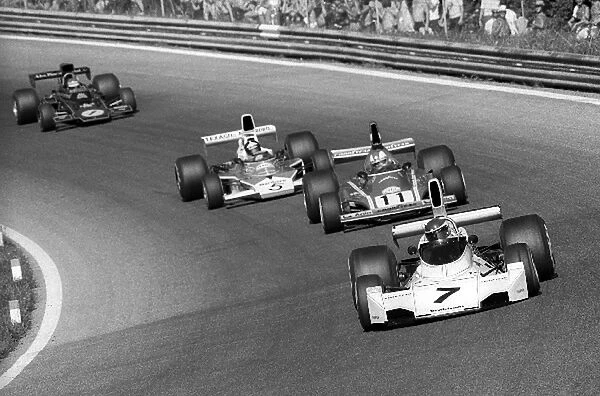 Formula One World Championship: Race winner Carlos Reutemann Brabham BT44 leads the race from fifth placed Clay Regazzoni Ferrari 312B3; Emerson