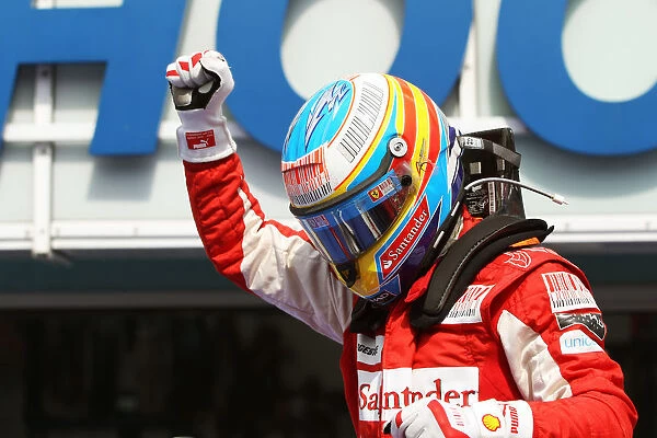 Formula One World Championship: Race winner Felipe Massa Ferrari celebrates in parc ferme