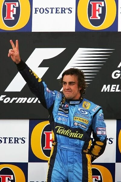 Formula One World Championship: Race winner Fernando Alonso Renault celebrates on the podium