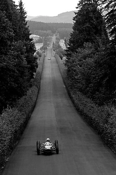 Formula One World Championship: Race winner John Surtees Ferrari 156 heads along the legendary undulating straight