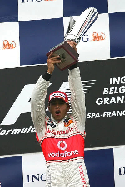 Formula One World Championship: Race winner Lewis Hamilton McLaren on the podium
