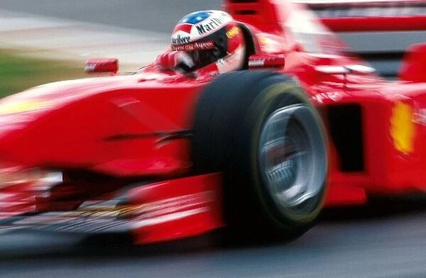 Formula One World Championship: Race winner Michael Schumacher Ferrari F300