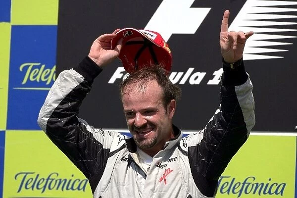 Formula One World Championship: Race winner Rubens Barrichello Brawn Grand Prix on the podium