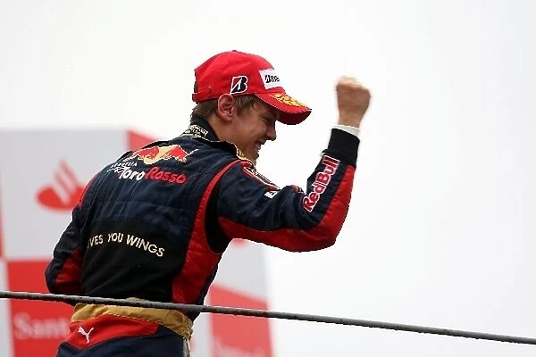 Formula One World Championship: Race winner Sebastian Vettel Scuderia Toro Rosso on the podium