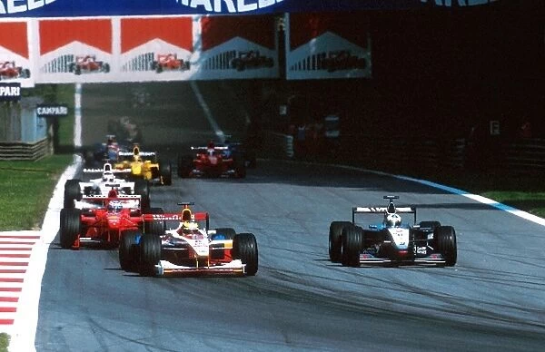 Formula One World Championship: Ralf Schumacher Williams FW21 leads the midfield pack