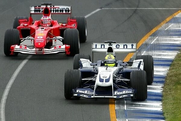 Formula One World Championship: Ralf Schumacher Williams BMW FW26 leads Rubens Barrichello Ferrari F2004