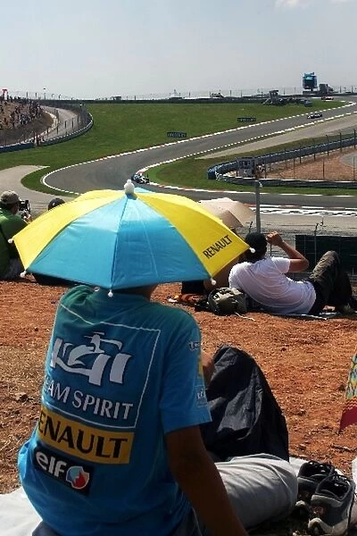 Formula One World Championship: Renault fan watches Fernando Alonso Renault R26