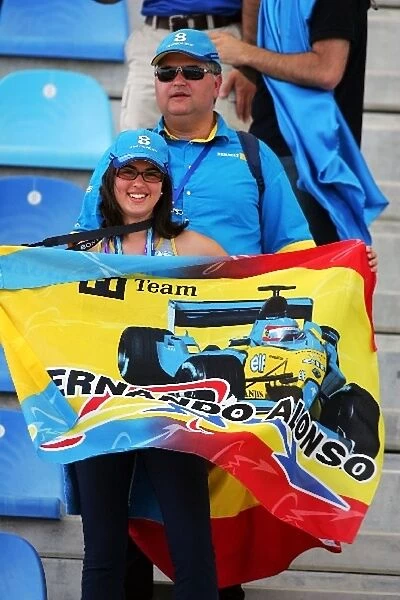 Formula One World Championship: Renault fans celebrate pole position for Fernando Alonso Renault