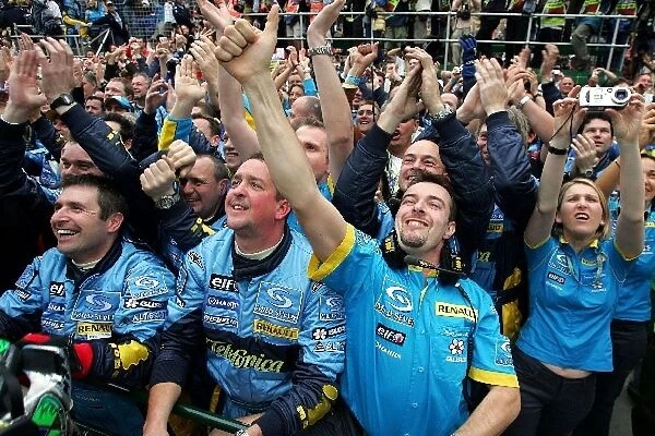 Formula One World Championship: Renault mechanics celebrate victory