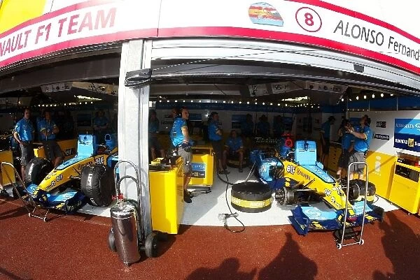Formula One World Championship: The Renault R24s of Jarno Trulli Renault R24 and Fernando Alonso Renault R24 in the pits