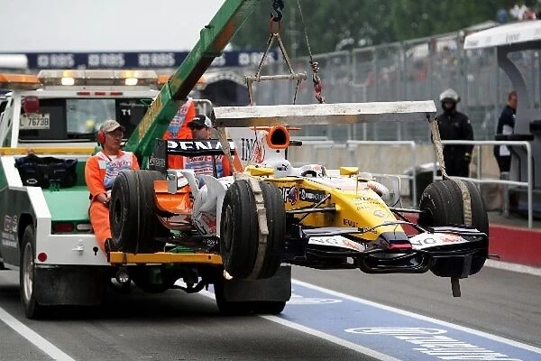 Formula One World Championship: the Renault R28 of Fernando Alonso Renault is recovered to the pits