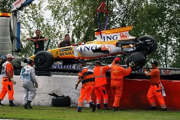 Formula One World Championship: The Renault R29 of Romain Grosjean Renault is carried away