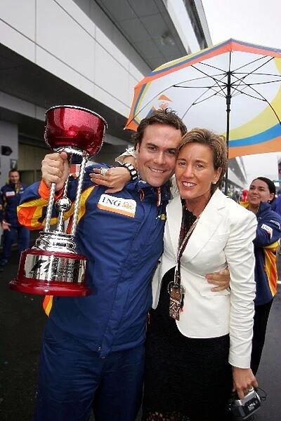 Formula One World Championship: Rhys Edwards with Isabelle Conner ING Sponsorship Director celebrates 2nd place with the Renault team