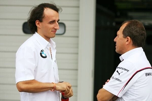 Formula One World Championship: Robert Kubica, BMW Sauber, with Willi Rampf BMW Sauber Chassis Technical Director