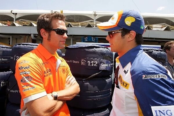 Formula One World Championship: Roldan Rodriguez Spyker Test Driver talks with Nelson Piquet Jr. Renault Test Driver