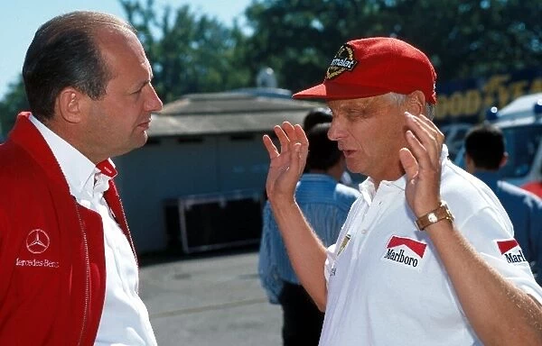 Formula One World Championship: Ron Dennis Mclaren Boss and Niki Lauda, right