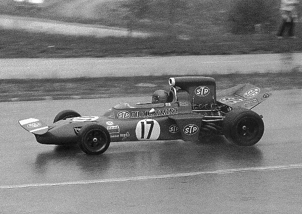 Formula One World Championship: Ronnie Peterson March 711, was a match for Jackie Stewart in the wet, and led the race for 13 laps