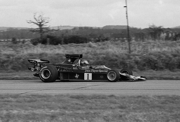 Formula One World Championship: Ronnie Peterson tests the Lotus JPS9 with double Deck rear wing