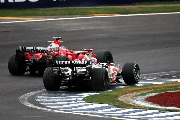 Formula One World Championship: Rubens Barrichello Ferrari F2005 passes Jenson Button BAR Honda 007
