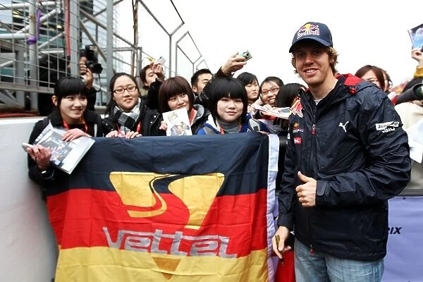 Formula One World Championship: Sebastian Vettel Red Bull Racing with fans