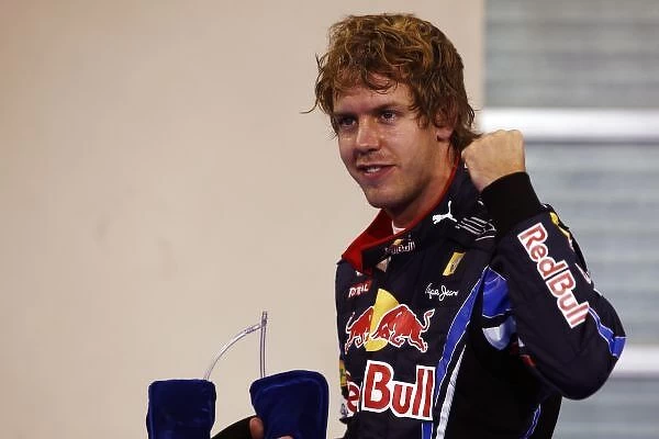 Formula One World Championship: Sebastian Vettel Red Bull Racing celebrates his pole position in parc ferme