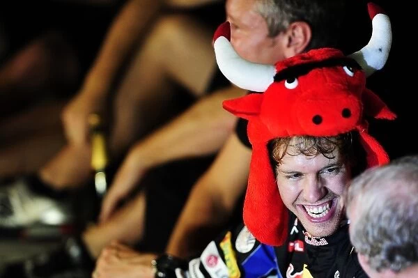 Formula One World Championship: Sebatian Vettel Red Bull Racing celebrates his championship win with the team